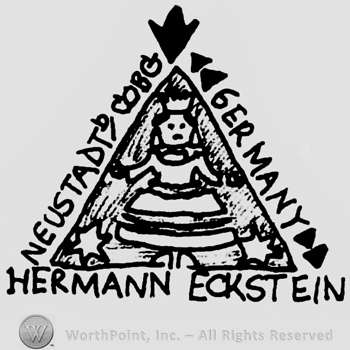 Puppet with crown in a triangle, Hermann Eckstein Neustadt Cobg Germany written with uppercase letters outside and along the triangle