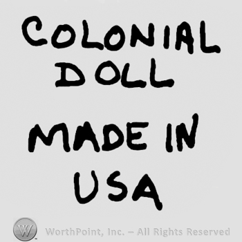Colonial Doll Made in USA written with uppercase letters