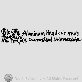 Aluminium Heads & Hands Guarranteed Unbreakable written with lowercase letters, precedeed by undescifrable handwriting over Trade Mark New York, NY