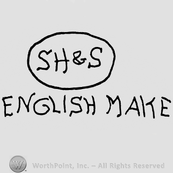 SH&S inside an oval over English Make written with uppercase letters
