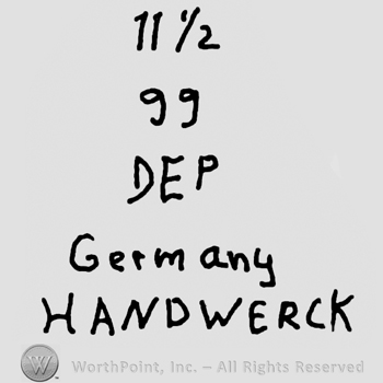 Number 11 1/2 over number 99, over uppercase DEP over Germany written with lowercase letters over Handwerck written with uppercase letters