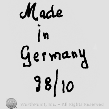 Made in Germany written with lowercase letters over numbers 98/10