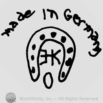 Horseshoe with EK written inside;MADE IN GERMANY on top