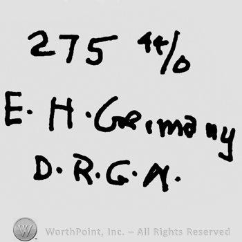 Number 275 and 44/0 over uppercase E.H. And Germany written with lowercase letters, uppercase D.R.G.M.written below