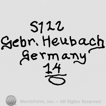 Uppercase S and number 122 over Gebr. Heubach Germany written with lowercase letters, number 14 over a circle