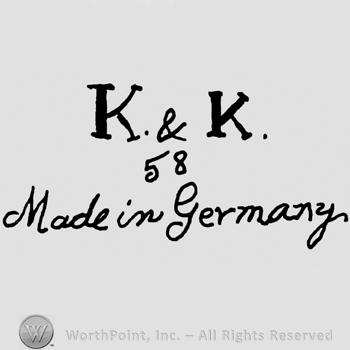 Uppercase K&K over number 58 and handwritten Made in Germany