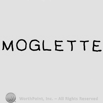 Moglette written with uppercase letters