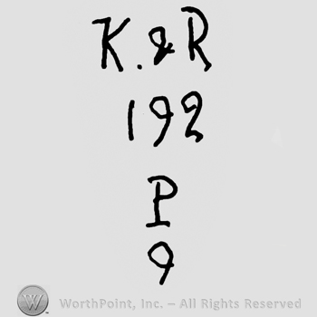 Uppercase K&R over number 192, uppercase P and number 9