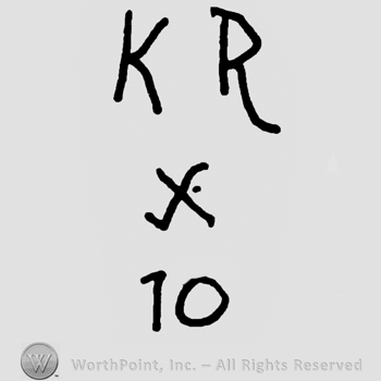 Uppercase KR over capital X and number 10