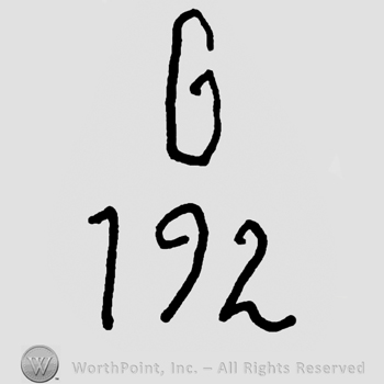 Uppercase G over number 192