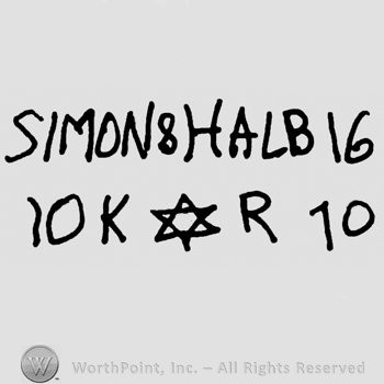Simon & Halbig written with uppercase letters next to number 16 over number 10 written twive on sides of capital K&R, the star of David written between the letters