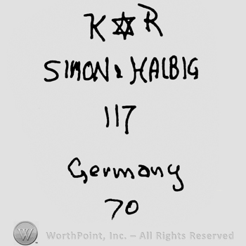 Uppercase KR with the star of David in between over Simon & Habig written with uppercase letters, number 117 and Germany written with lowercase letters over number 70