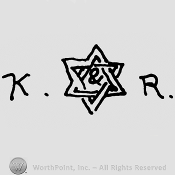 Uppercase KR with the star of David in between