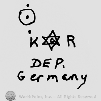 Circle with dot inside, Uppercase KR with the star of David in between over DEP with uppercase letters and Germany written with lowercase letters