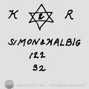 Uppercase KR with the star of David in between over Simon & Halbig written with uppercase letters, numers 122 and 32