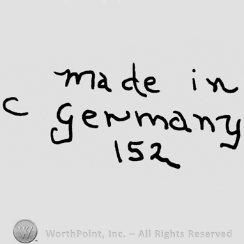 Made in Germany written with lowercase letters over number 152 precedeed by capital C