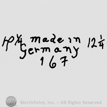 Made in Germany written with lowercase letters over number 167, precedeed by uppercase handwritten H and followed by number 12 and 1/4