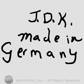 Uppercase J.D.K over Made in Germany written with lowercase letters