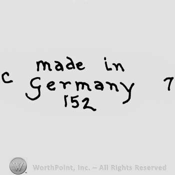 Made in Germany written with lowercase letters over number 152, precedeed by capital C and followed by number 7