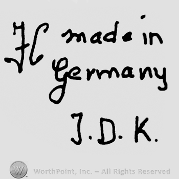 Uppercase handwritten H, Made in Germany written with lowercase letters over uppercase J.D.K.