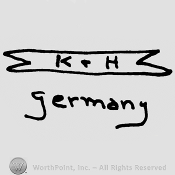 Uppercase K&H on a label over Germany written with lowercase letters