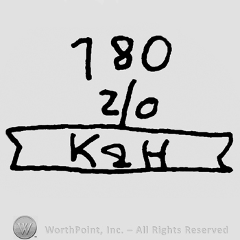 Number 180 over 2/0, uppercase K&H written on a label, below