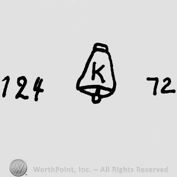 Uppercase K on a bell precedeed by number 124 and followed by number 72