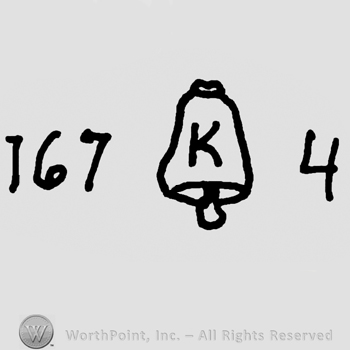 Uppercase K on a bell precedeed by number 167 and followed by number 4