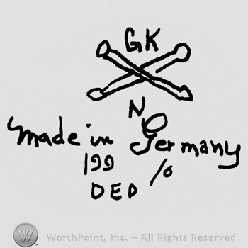 Uppercase G.K.over crossed bones, uppercase N below, Made in Germany written with lowercase letters over number190/0, DEP with uppercase letters