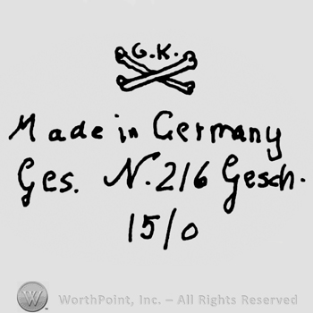 Uppercase G.K.over crossed bones, Made in Germany Ges. N. 216 Gesch. Written with lowercase letters over 15/0