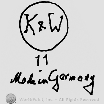 Uppercase K&W inside a circle, over number 11 and Made in Germany handwritten with lowercase letters