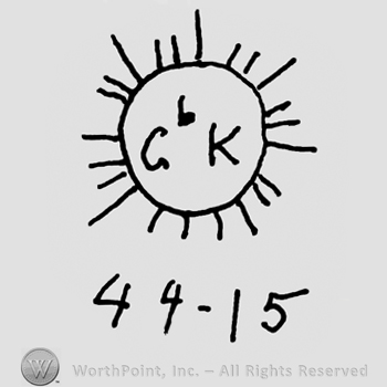 Uppercase G&K inside a sun, numbers 44 and 15 written below