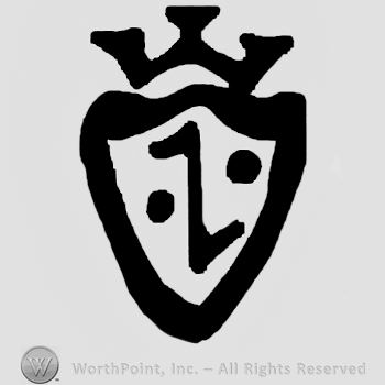 Uppercase Z and two dots in a shield with a crown above.