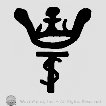 Crown over entwined uppercase TS
