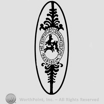 Deer playing in an oval ornamented design