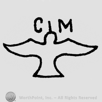 Eagle and uppercase CM.