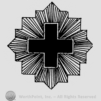 A medal;cross inside of a geometric shape.