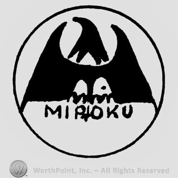 Eagle shape with opened wings;MIROKU written bellow;everythinginside of a circle.