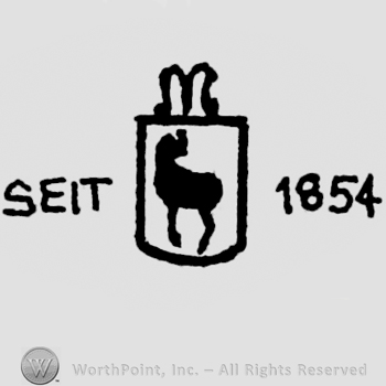 Kind of shield shape with a deer inside;word SEIT written in the left side;number 1854 written in the right side.