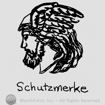 A god head with wings and SCHUTZMERKE.