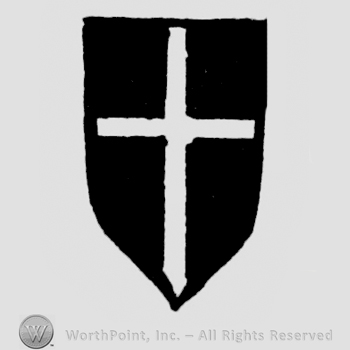Black shield with cross on.