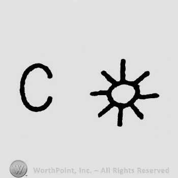 Letter C and a sun.