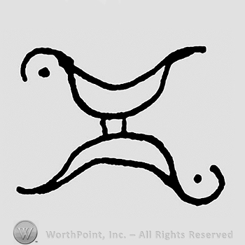 Two birds joined at the feet.