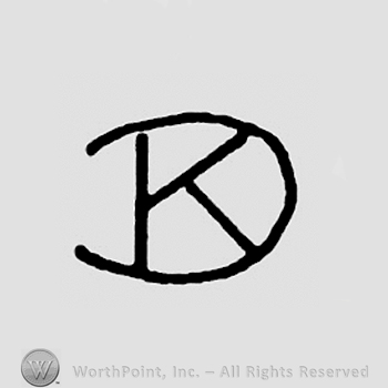 Uppercase letters DK in monogram.