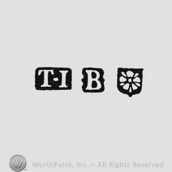 TI, pellet between; letter B and Flower