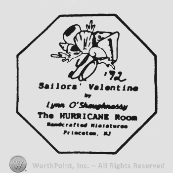 Flower '92 handwriting LO beneath Sailors Valentine and writing beneath all inside a octagon