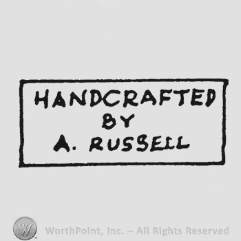 Label writing Handcrafted by A . Russell in capital letters