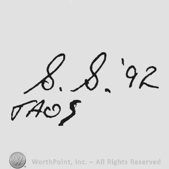 Handwriting initials S.S. '92 above Taos under