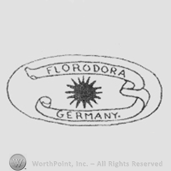 Ribbon around sunburst with inscription Florodora Germany, inside an oval