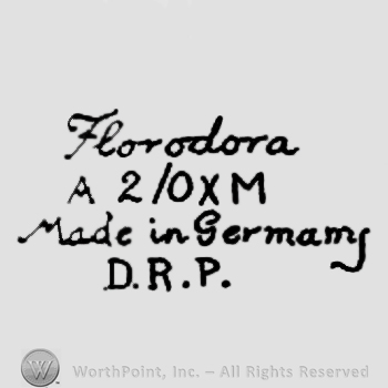 Hand lettered on 4 rows: Florodora, A 2/OX M, Made in Germany, D.R.P.